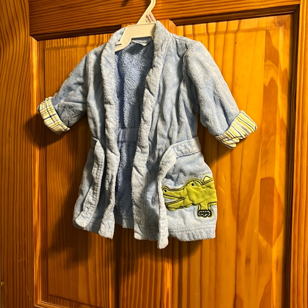 Super cute bath robe size 0-9 months by Carter’s